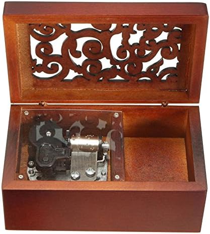 קופסה מוזיקלית עתיקה עתיקה עץ, נשיקה את קופסת המוזיקלית של הגשם, עם תנועת ציפוי כסף פנימה, מתומן